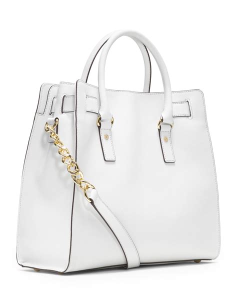 michael kors white drawstring bag|Michael Kors saffiano tote bag.